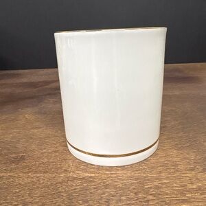 Elegant White Ceramic Cup with Gold Accent
